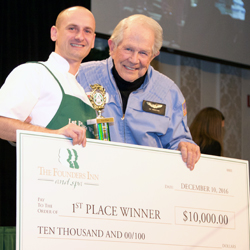 Dr. M.G. “Pat” Robertson with the top Holiday Bakeaway contestant.