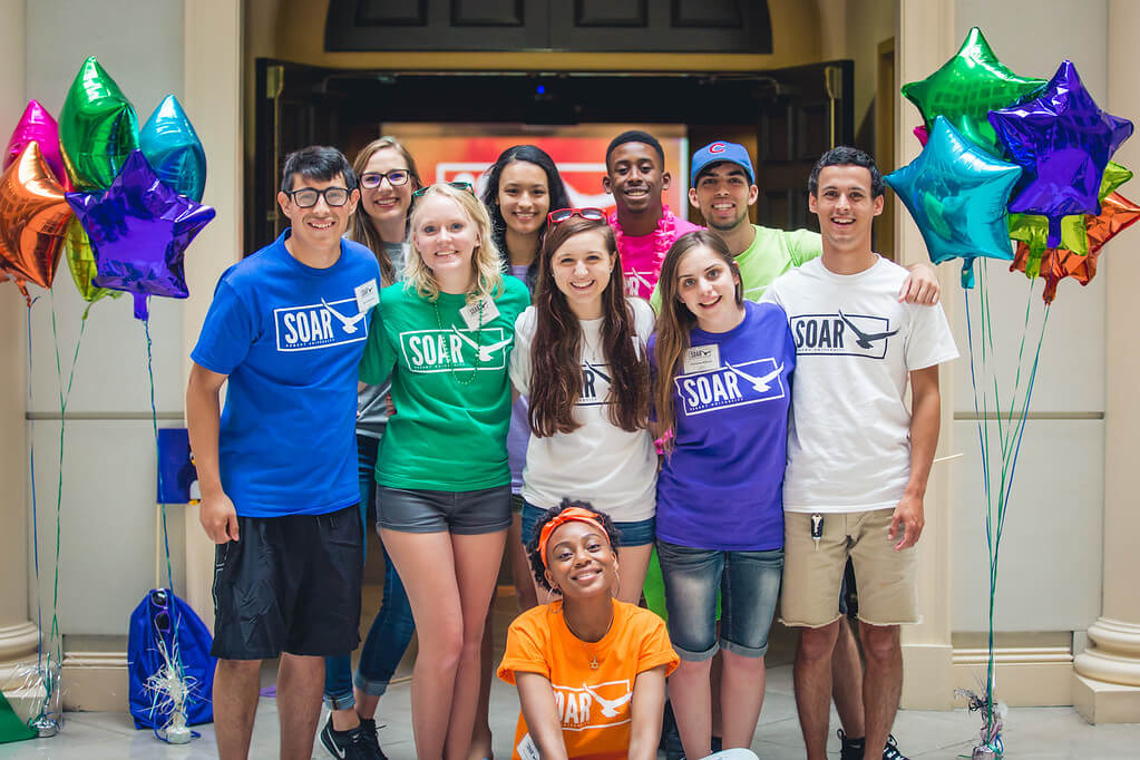 Orientation Leaders in their colorful SOAR t-shirts.