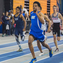 Regent student Jonathan Kemp crossed the finish line first in his heat during the 400-meter event. Photo courtesy of Elisa Sosa.