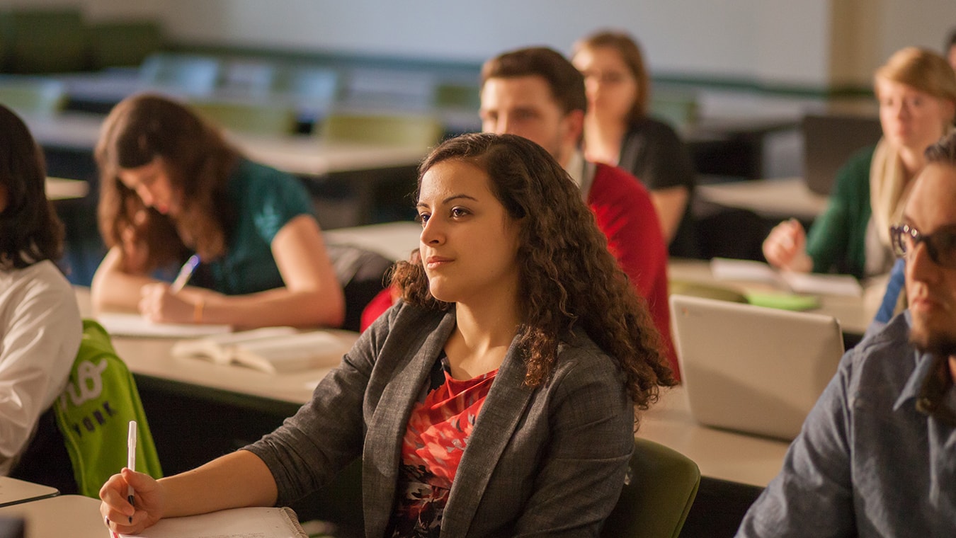 A student attends a class at Regent University, Virginia Beach.