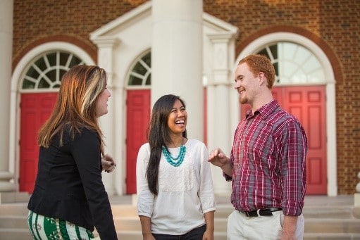 Students enjoy a chat at Regent University's campus in Virginia Beach.