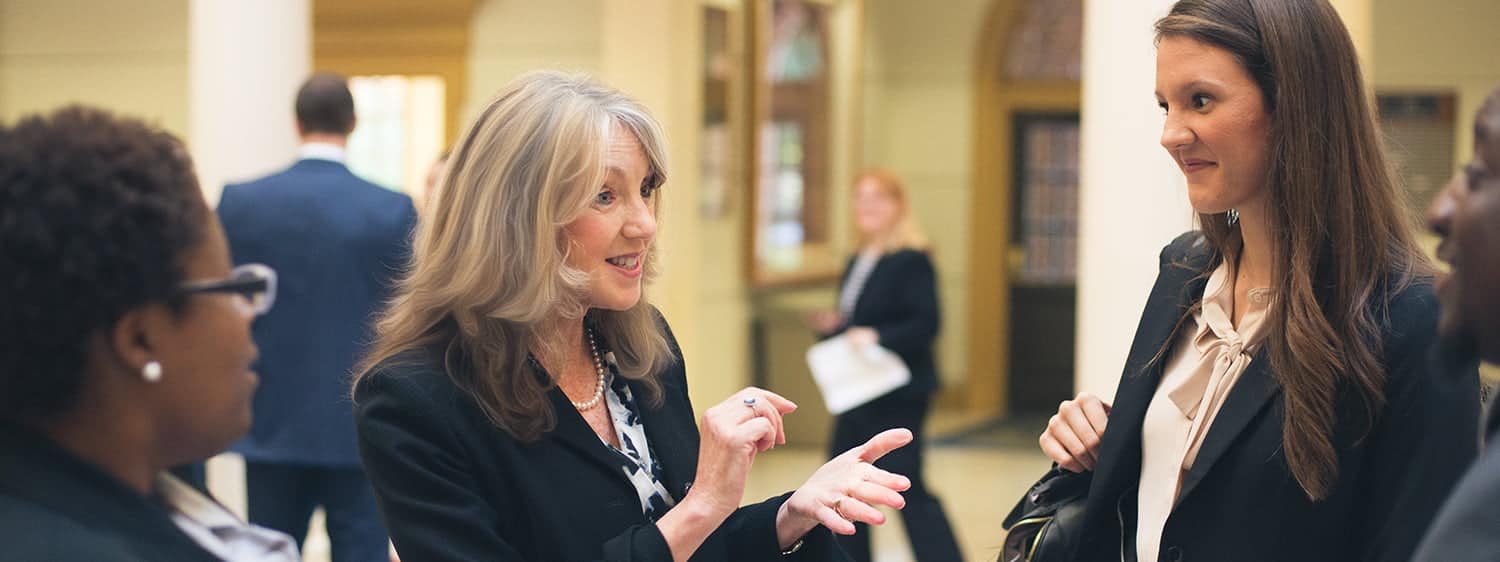 A law professor chats with students: Pursue a Master of Arts in Law degree - Alternative Dispute Resolution online at Regent University.