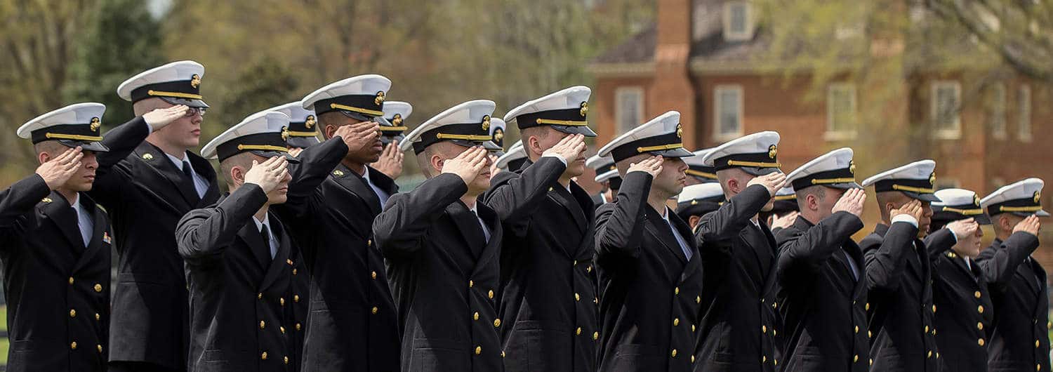 Military officers line up in their dress blues on the Regent University campus in Virginia Beach, VA.
