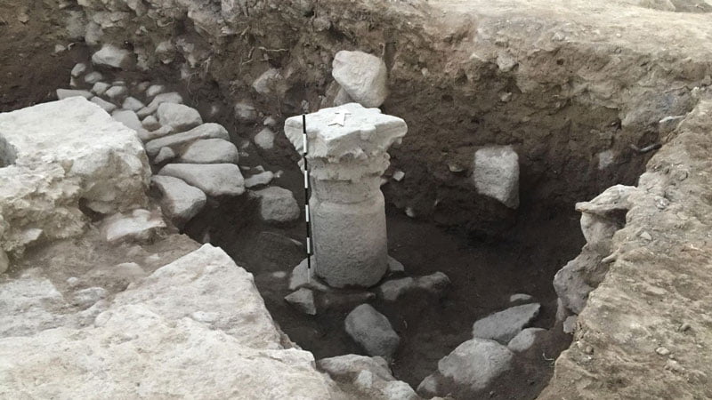 Stone column base found at El Araj, part of the Byzantine structure identified as a church