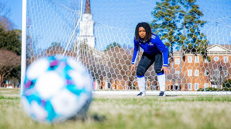 Marelly Balentina focused in goal during soccer practice at Regent University