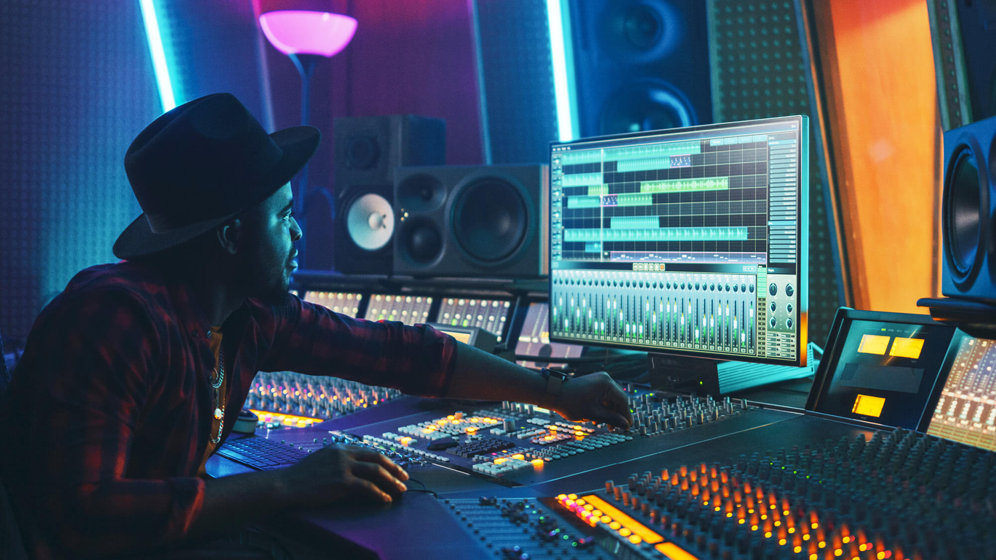 A student writing a song at Regent University: Explore our songwriting degree program.