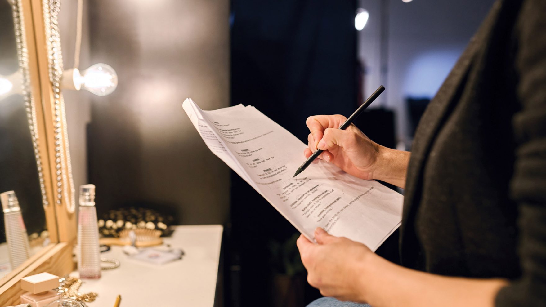 a Playwright, reviewing a script.