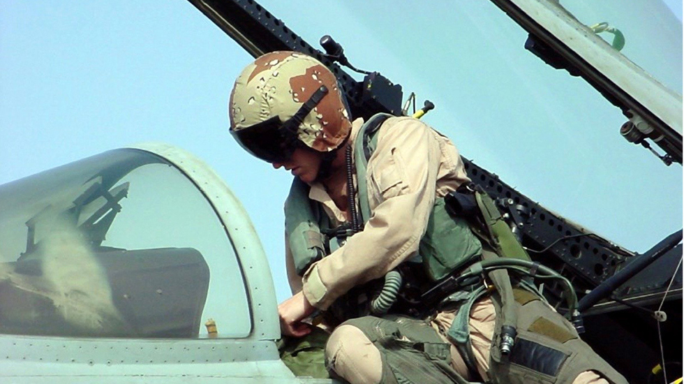 Rebecca Calder, by a plane.