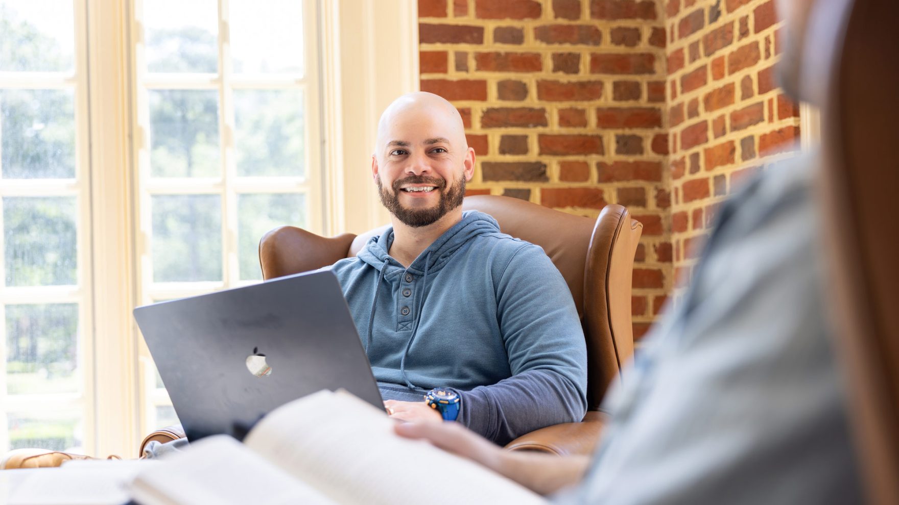 Student working on his laptop