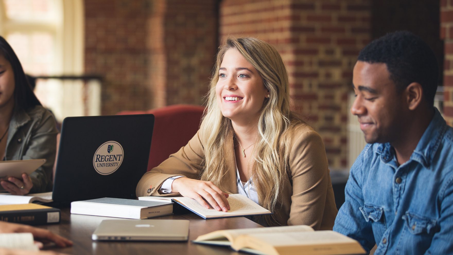 Members of the Regent community at the university's library in Virginia Beach.