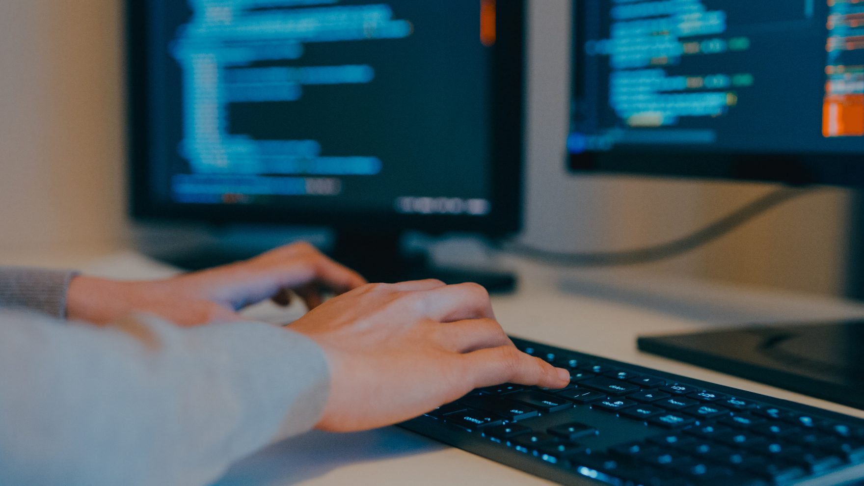 Cybersecurity student at the computer