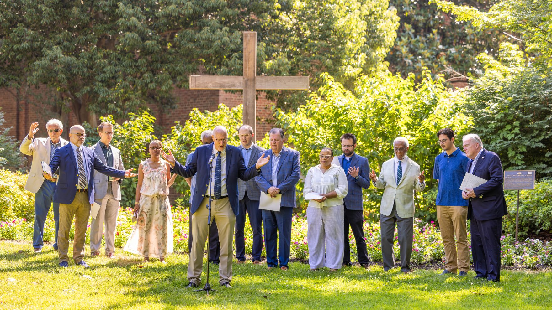 Regent University School of Divinity leaders praying at the dedication ceremony for the new Center for the Great Commission.