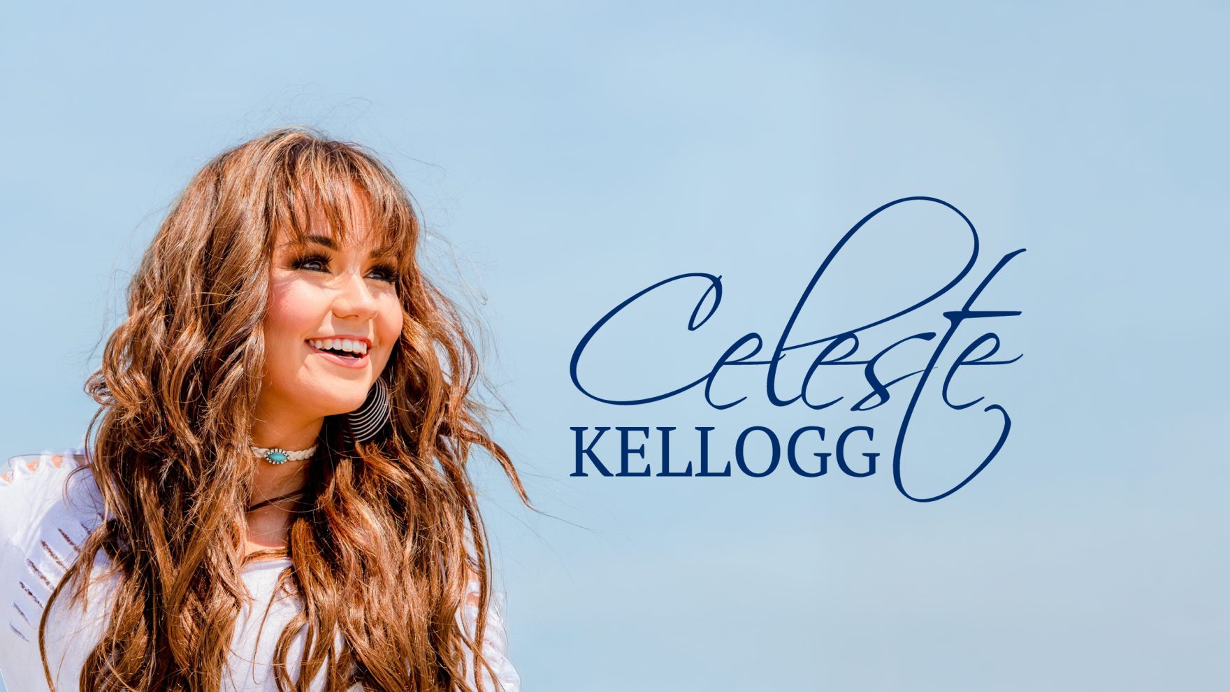 Photo of country artist Celeste Kellogg smiling under a blue sky.