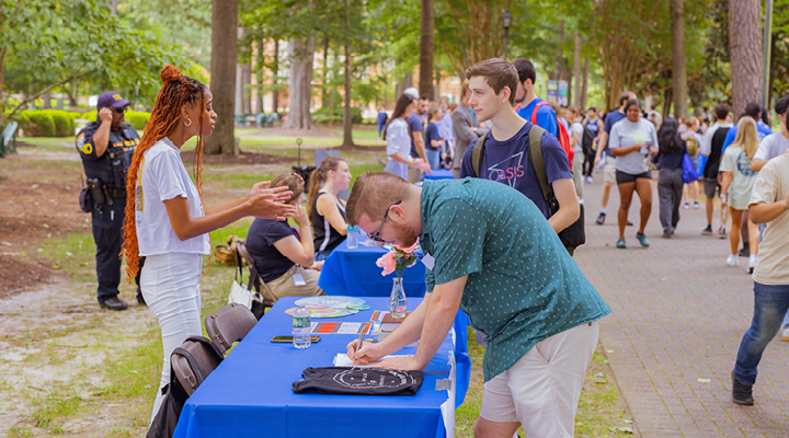 Students registering for the campus connection fair