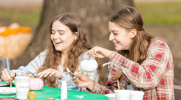 Students participating in harvest fest on the Regent University campus